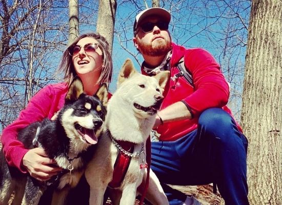 Daniel with his wife and dogs